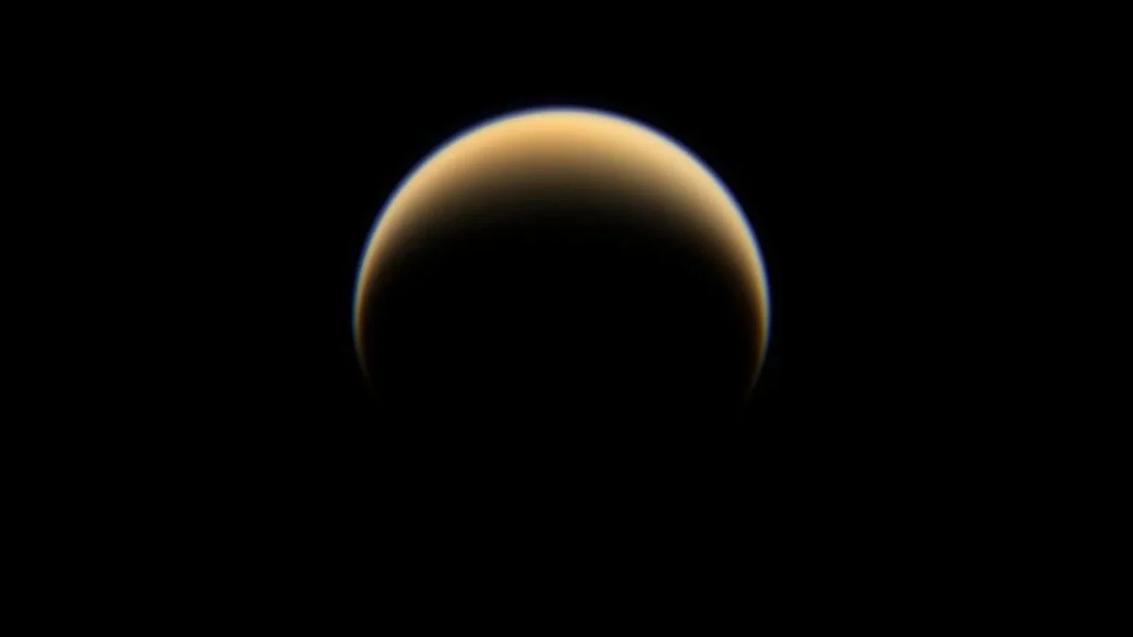 Infrared Mystery Uncovered: Shared Chemistry Between Pluto and Titan